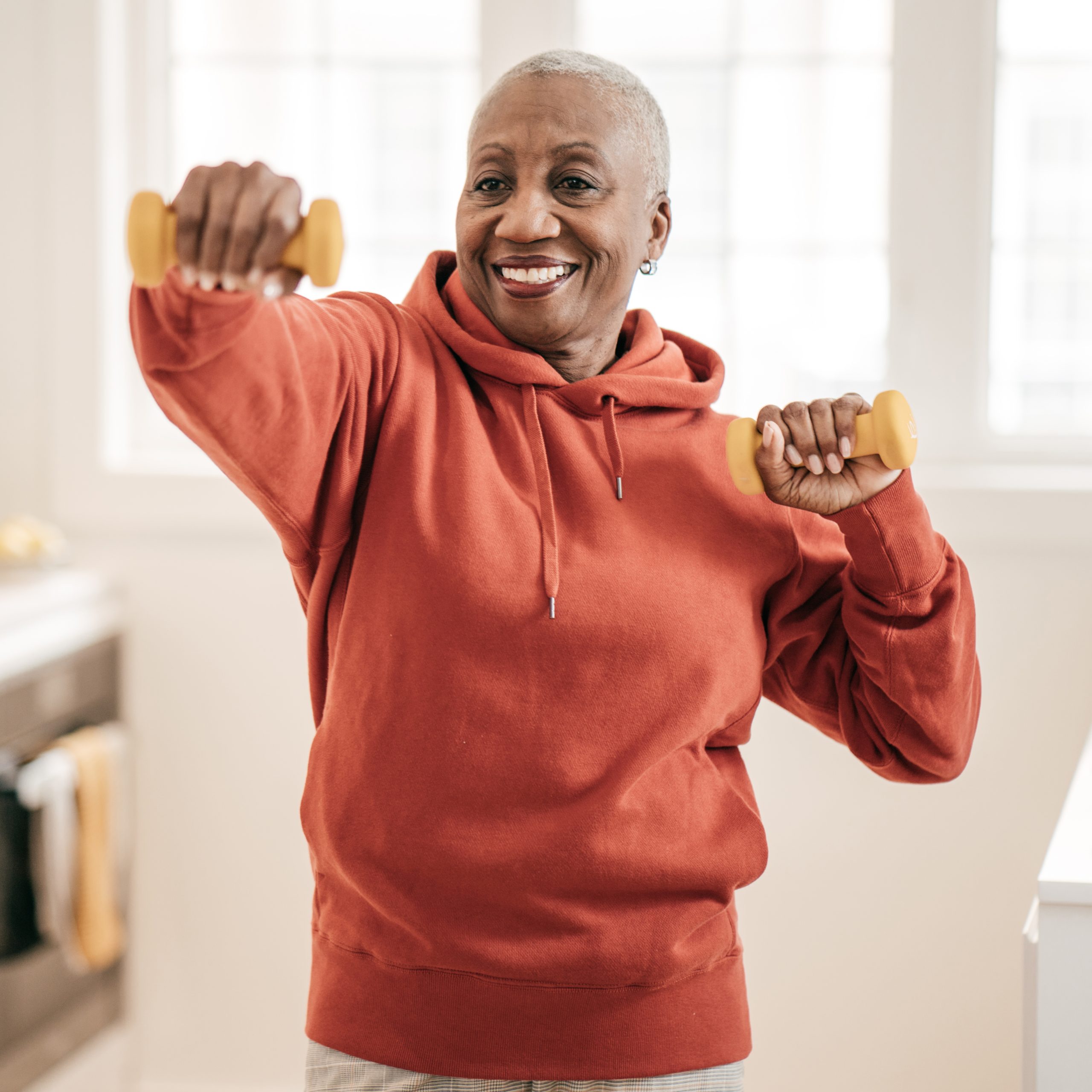 senior woman exercising at home